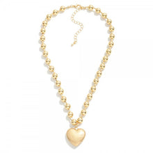 Metallic Beaded Necklace Featuring Heart Pendant