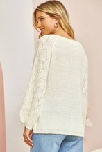 The Ivory Sweater