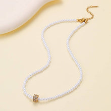 Encrusted Ring Pearl Necklace