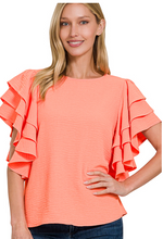 The Going to Town Ruffles Top in Coral