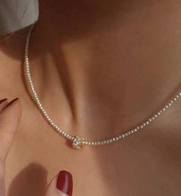 Encrusted Ring Pearl Necklace