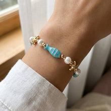 Fish, Pearl, And Starfish Bracelet